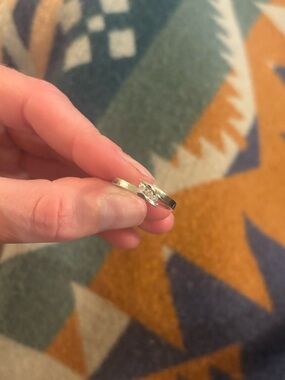 Dainty ring with three small diamonds